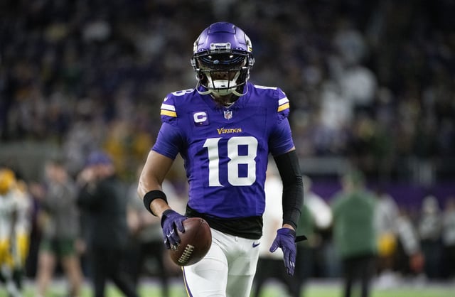 Justin Jefferson #18 of the Minnesota Vikings warms up before the game against the Green Bay Packers at U.S. Bank Stadium on December 31, 2023 in Minneapolis, Minnesota.