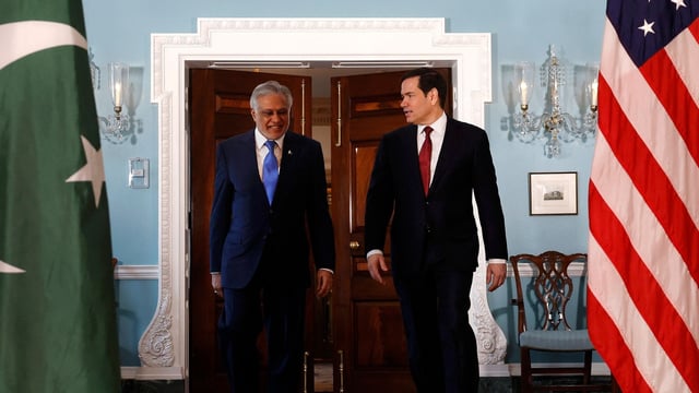US secretary of state Marco Rubio (R) and Pakistani foreign minister Ishaq Dar walk together prior to a meeting at the department of state on July 25, 2025 in Washington, DC.