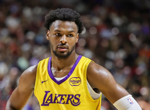 Bronny James #9 of the Los Angeles Lakers stands on the court during a break in the second half of a 2025 NBA Summer League game against the Dallas Mavericks at the Thomas &amp; Mack Center on July 10, 2025 in Las Vegas, Nevada.