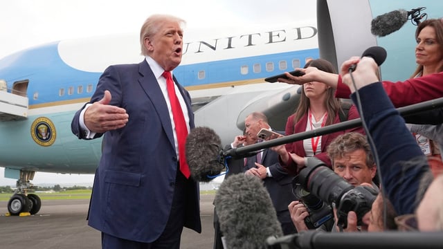 President Donald Trump speaks to members of the media after he arrived at Prestwick Airport in Ayrshire, Scotland, on Friday,