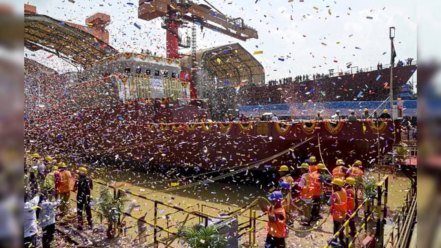 Workers at the launch of 'Ajay', an Anti-Submarine Warfare Shallow Wate...