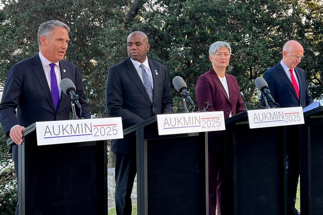 Australia's Defence Minister Richard Marles, Britain's Foreign Secretary David Lammy, Australia's Foreign Minister Penny Wong, and Britain's Defence Secretary John Healey speak to media at Admiralty House during the Australia-UK Ministerial Consultations (AUKMIN) in Sydney, Australia July 25, 2025. REUTERS/Kirsty Needham/File Photo