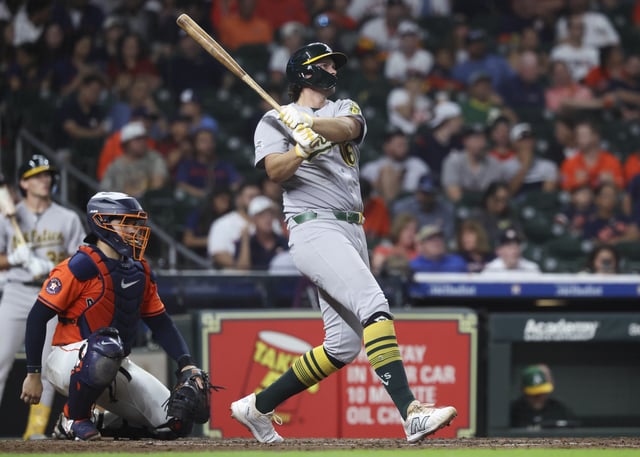 Jul 25, 2025; Houston, Texas, USA;  Athletics designated hitter Nick Kurtz (16) hits his third home run of the game during the eighth inning against the Houston Astros at Daikin Park. Mandatory Credit: Troy Taormina-Imagn Images