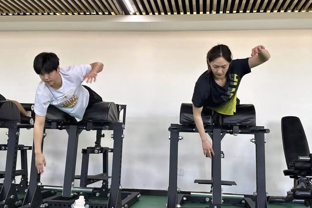 Yu (left) in training in January this year.
