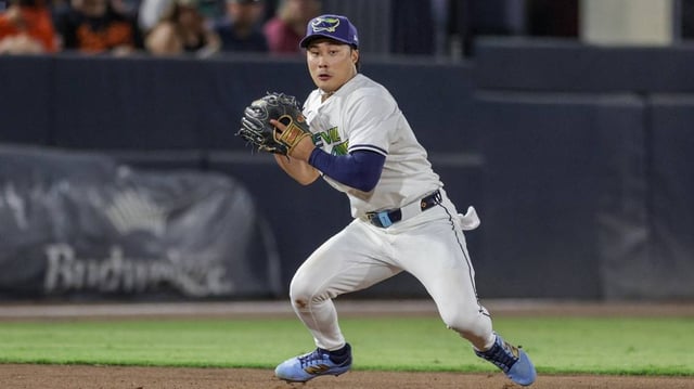 Jul 19, 2025; Tampa, Florida, USA; Tampa Bay Rays shortstop Ha-Seong Kim (7) fields the ball against the Baltimore Orioles in the eighth inning at George M. Steinbrenner Field. Mandatory Credit: Nathan Ray Seebeck-Imagn Images