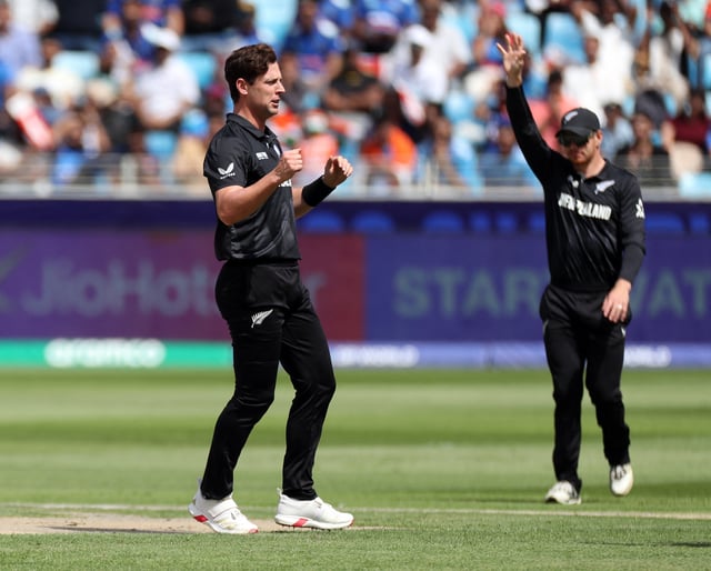 Cricket - ICC Men's Champions Trophy - Group A - India v New Zealand - Dubai International Stadium, Dubai, United Arab Emirates - March 2, 2025 New Zealand's Matt Henry celebrates with teammates after taking the wicket of India's Virat Kohli, caught out by Glenn Phillips REUTERS/Satish Kumar/File Photo