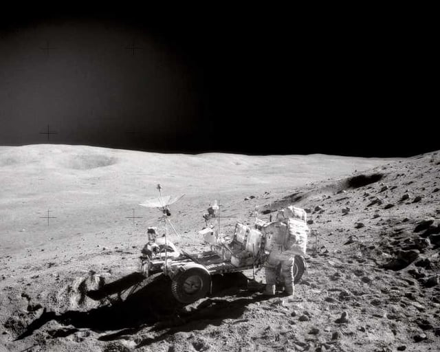 Apollo 16 astronauts on the Moon's Stone Mountain. Image b NASA Charles M. Duke Jr. - Image, Public Domain.