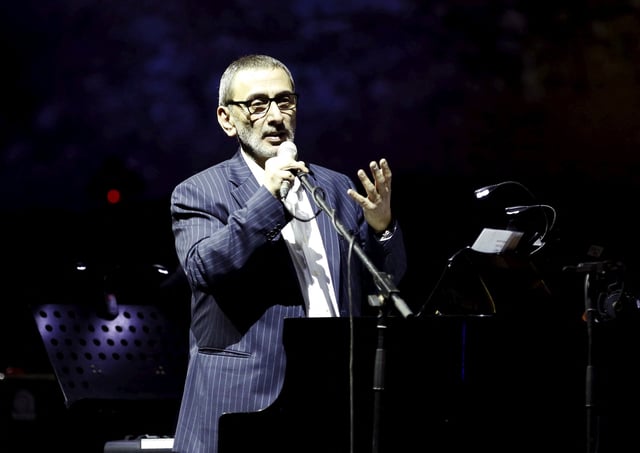 Lebanese musician and composer Ziad Rahbani performs during a concert at the Ehdeniyat International Festival in Ehden town, northern Lebanon July 30, 2015. REUTERS/Jamal Saidi/File Photo