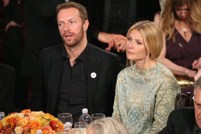Singer Chris Martin and actress Gwyneth Paltrow at the 71st Annual Golden Globe Awards held at the Beverly Hilton Hotel on January 12, 2014.