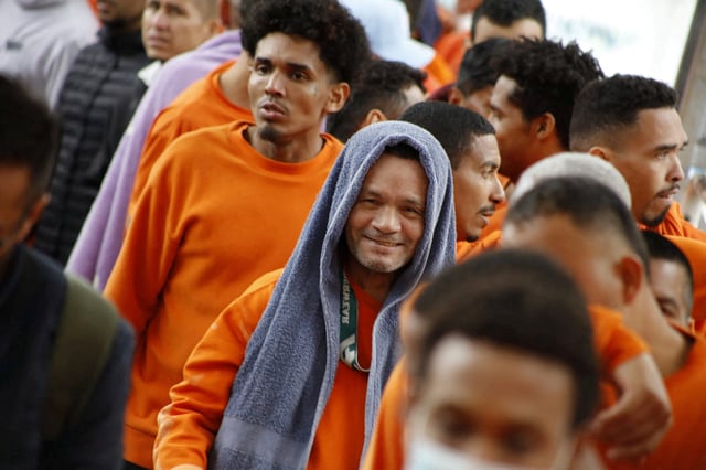 A Colombian deported by the Ecuadorian government reacts at the Rumichaca International Bridge in Colombia, July 26, 2025. Colombian Foreign Ministry/Handout via REUTERS