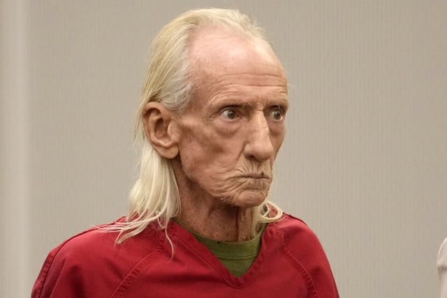 FILE - Joseph Czuba, 71, stands before Circuit Judge Dave Carlson for his arraignment at the Will County courthouse, Oct. 30, 2023, in Joliet, Ill. (AP Photo/Charles Rex Arbogast, File)