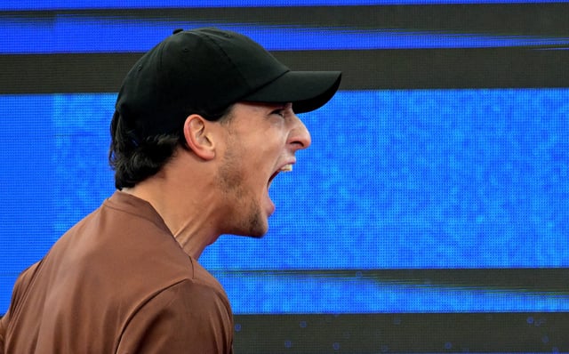 Tennis - Hamburg European Open - Am Rothenbaum, Hamburg, Germany - May 22, 2025 Italy's Luciano Darderi reacts during a match. REUTERS/Fabian Bimmer/File Photo