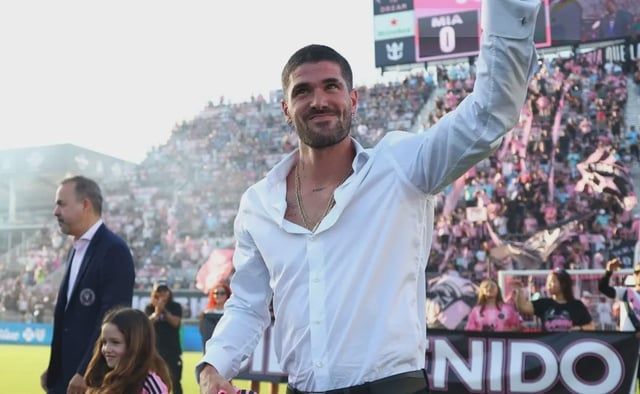 Rodrigo de Paul, Inter Miami CF new signing, waves to fans as he is introduced as a new player prior to the MLS match between Inter Miami CF and FC Cincinnati at Chase Stadium on July 26, 2025 in Fort Lauderdale, Florida.
