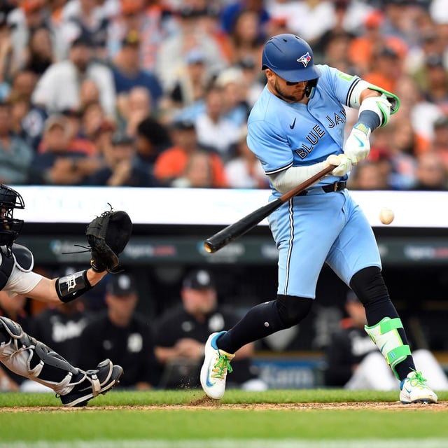 Toronto Blue Jays' Bo Bichette singles during the eighth inning of a baseball game against the Detroit Tigers, Saturday, July 26, 2025, in Detroit. (AP Photo/Jose Juarez)