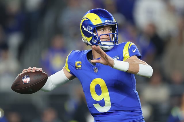 Matthew Stafford #9 of the Los Angeles Rams throws a pass during the NFL playoff game at State Farm Stadium on January 13, 2025 in Glendale, Arizona. The Rams defeated the Vikings 27-9.