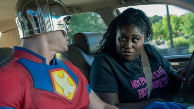 Peacemaker sitting in a car in Season 2.