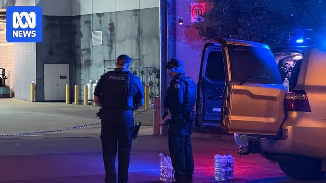 police in front of a loading dock