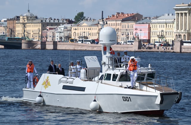 Russian President Vladimir Putin is seen onboard a Raptor patrol boat on Russia's Navy Day in Saint Petersburg, Russia, July 27, 2025. Sputnik/Alexei Danichev/Pool via REUTERS