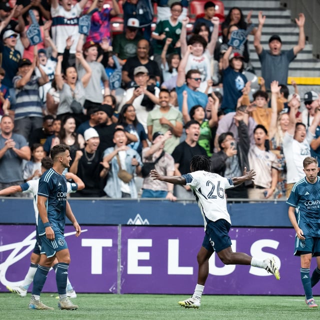 Vancouver Whitecaps' Jean-Claude Ngando (26) celebrates his goal against the Sporting Kansas City during the first half of an MLS soccer match in Vancouver, on Saturday, July 26, 2025. THE CANADIAN PRESS/Ethan Cairns