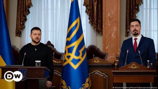 Ukrainian President Volodymyr Zelenskyy, left, addresses the Supreme Court of Ukraine as Chief Justice Vsevolod Kniaziev, right, looks on during the opening ceremony for the court session at the Grand Chamber of the Klov Place, December 15, 2022 in Kyiv, Ukraine. 