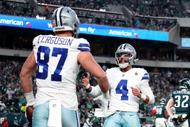 Jake Ferguson #87 of the Dallas Cowboys celebrates after a touchdown with Dak Prescott #4 during the first half in the game against the Philadelphia Eagles at Lincoln Financial Field on November 05, 2023 in Philadelphia, Pennsylvania.