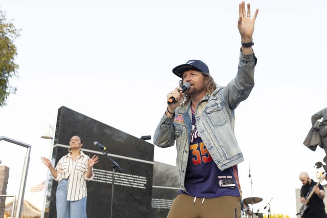 Traveling evangelical musician Sean Feucht preaches during the final stop of &#34;Kingdom to the Capitol&#34; prayer rally at Wesley Bolin Memorial Plaza outside the Arizona State Capitol in Phoenix, Arizona, October 19, 2024.