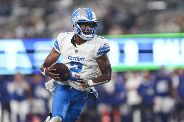 Hendon Hooker #2 of the Detroit Lions runs the ball during an NFL football game against the New York Giants at MetLife Stadium on August 8, 2024 in East Rutherford, NJ.