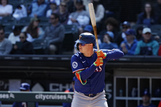 May 24, 2025; Chicago, Illinois, USA; Texas Rangers designated hitter Joc Pederson (4) bats against the Chicago White Sox during the first inning at Rate Field. Mandatory Credit: Kamil Krzaczynski-Imagn Images/File Photo