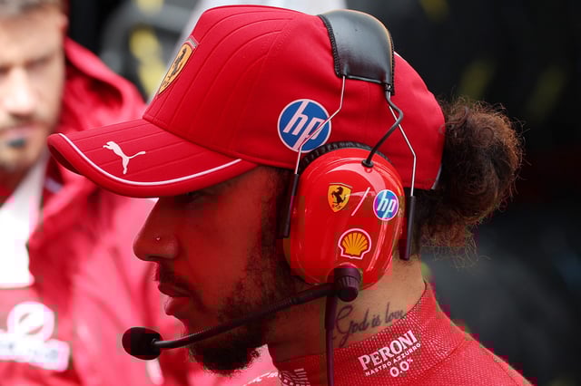 Formula One F1 - Belgian Grand Prix - Circuit de Spa-Francorchamps, Stavelot, Belgium - July 27, 2025 Ferrari's Lewis Hamilton after the start of the race was delayed due to weather REUTERS/Yves Herman/Pool