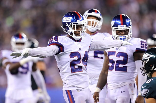 Eli Apple #24 of the New York Giants celebrates a tackle against the Philadelphia Eagles during the third quarter at MetLife Stadium on October 11, 2018 in East Rutherford, New Jersey.