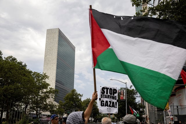 People rally in front of the United Nations headquarters during a "Stop Starving Gaza Now" protest amid the ongoing conflict between Israel and Hamas, in New York City, U.S., July 25, 2025. REUTERS/Christian Monterrosa/File Photo