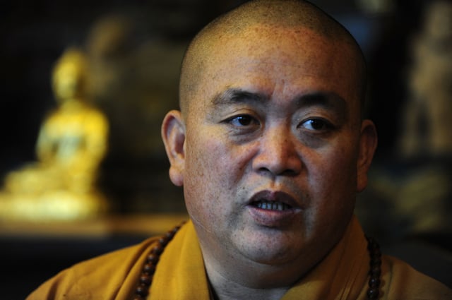The abbot of Shaolin Temple, Shi Yongxin, speaking at the famous temple in Henan province, on November 8, 2009.