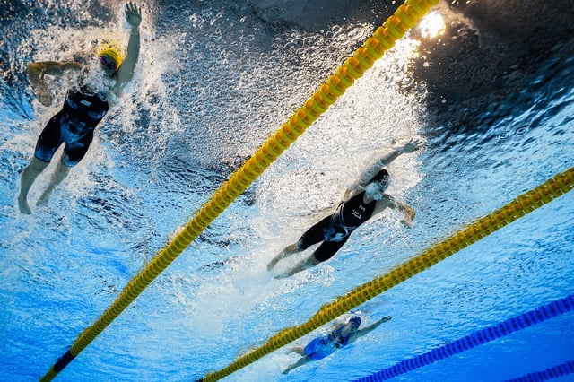 Swimming - World Aquatics Championships - Women's 400m Freestyle Final - World Aquatics Championships Arena, Singapore - July 27, 2025 Australia's Lani Pallister and Katie Ledecky of the U.S. in action REUTERS/Marko Djurica