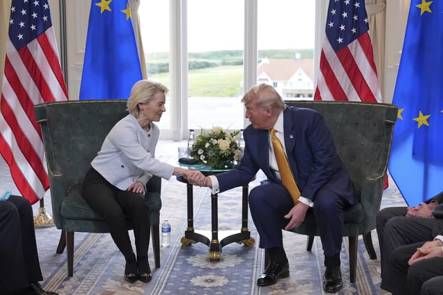 President Donald Trump shakes hands with European Commission President Ursula von der Leyen as they meet at the Trump Turnberry golf course in Turnberry, Scotland Sunday, July 27, 2025.