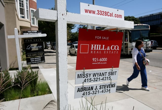 FILE PHOTO — SAN FRANCISCO – SEPTEMBER 18:  Signs advertise homes for sale September 18, 2008 in San Francisco, California. (Photo by Justin Sullivan/Getty Images)