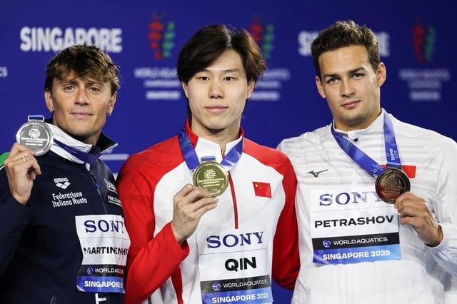 From left, Italy’s Nicolo Martinenghi, Qin Haiyang and Kyrgyzstan’s Denis Petrashov. Photo: EPA