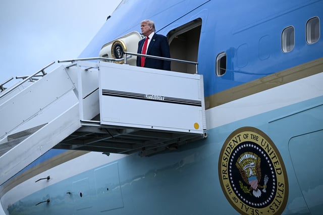 Donald Trump disembarks from Air Force One upon his arrival at Prestwick Airport, south of Glasgow on July 25, 2025, on the first day of his UK visit.