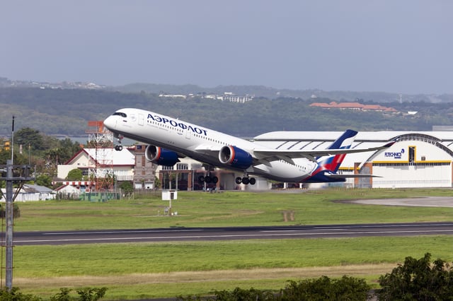 DENPASAR, INDONESIA - 2025/06/22: An Aeroflot Airbus 350-900 taking off from Denpasar Bali Ngurah Rai airport. Aeroflot does operate direct flights to Indonesia from Sheremetyevo airport. The route from Moscow to Bali can also include a transfer in in Asia: Hong Kong, Seoul or Bangkok. (Photo by Fabrizio Gandolfo/SOPA Images/LightRocket via Getty Images)
