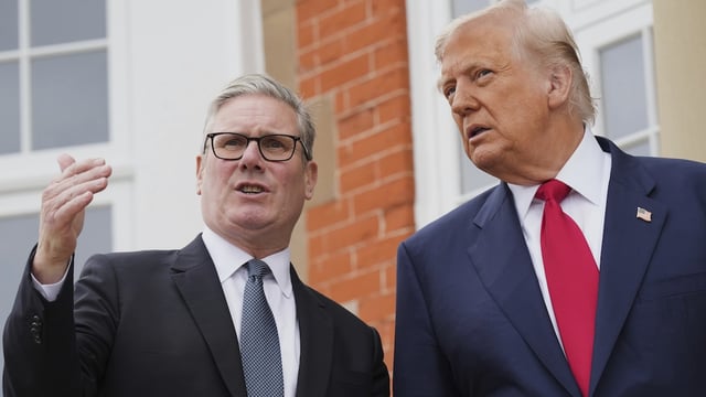 President Donald Trump, right, speaks with Britain’s Prime Minister Keir Starmer during an official greeting at the Trump Turnberry golf course in Turnberry, Scotland Monday, July 28, 2025. 