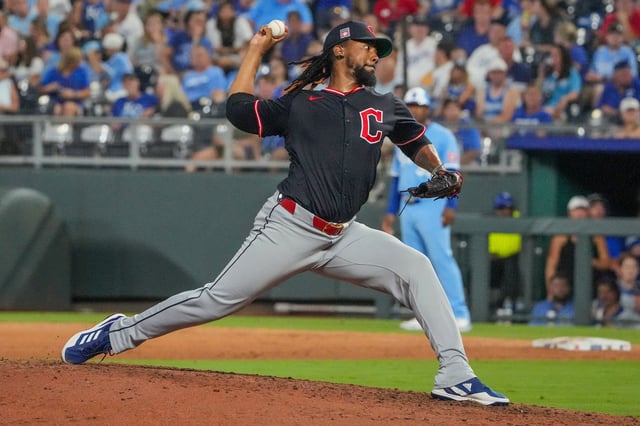 Jul 26, 2025; Kansas City, Missouri, USA; Cleveland Guardians relief pitcher Emmanuel Clase (48) delivers a pitch against the Kansas City Royals in the ninth inning at Kauffman Stadium. Mandatory Credit: Denny Medley-Imagn Images/File Photo