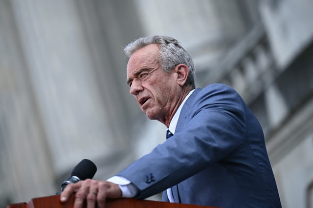 US Secretary of Health and Human Services Robert F. Kennedy Jr., speaks during a news conference at the USDA headquarters building in Washington, DC, on July 14, 2025. According to US media reports, ice cream makers in the US are planning to eliminate several artificial colors from their products by 2028. The announcement comes less than a week before National Ice Cream Day on July 20. (Photo by Brendan SMIALOWSKI / AFP) (Photo by BRENDAN SMIALOWSKI/AFP via Getty Images)