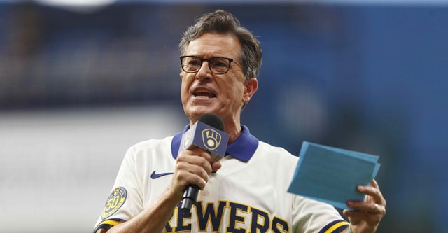 Aug 20, 2021; Milwaukee, Wisconsin, USA; Stephen Colbert addresses the crowd between inning of the game between the Washington Nationals and Milwaukee Brewers at American Family Field. Mandatory Credit: Jeff Hanisch-USA TODAY Sports