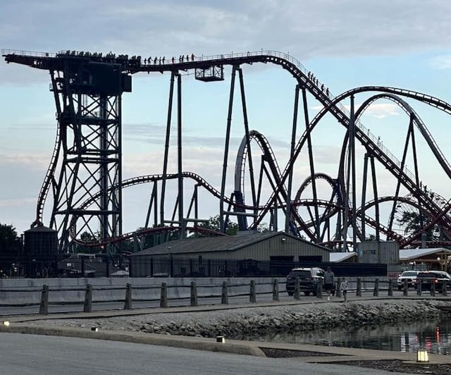 Riders evacuate from Siren&#39;s Curse on July 28 at Cedar Point in Sandusky, Ohio, marking the fifth malfunction of the rollercoaster since it opened to the public on June 28.