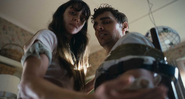 Alison Brie as Mille, left, and Dave Franco as Tim in “Together.”