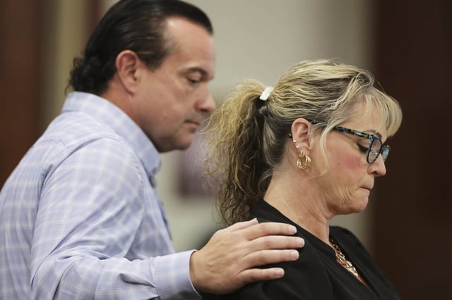 Steve Goncalves and Kristi Goncalves, parents of murder victim Kaylee Goncalves, stand at Bryan Kohberger's sentencing hearing in Boise on July 23.
