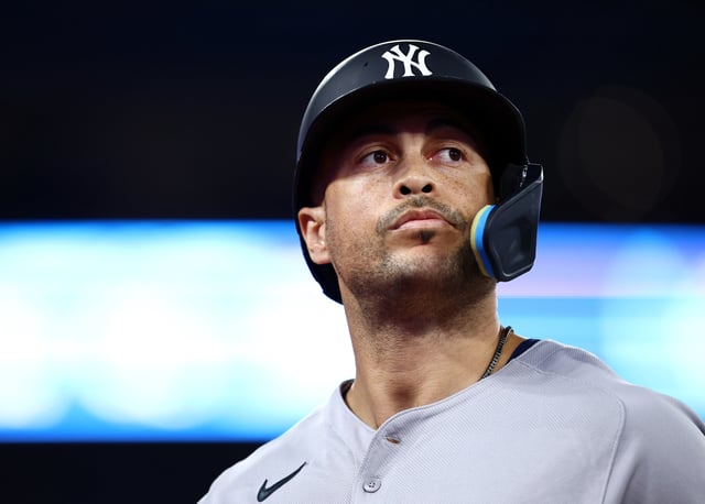 TORONTO, ON - JULY 21: Giancarlo Stanton #27 of the New York Yankees walks to the dugout during a game against the Toronto Blue Jays at Rogers Centre on July 21, 2025 in Toronto, Ontario, Canada. (Photo by Vaughn Ridley/Getty Images)