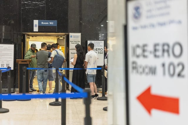 People wait in line to enter the U.S. Immigration and Customs Enforcement New York field office in Jacob K. Javitz Federal Building on July 28, 2025 in New York City.
