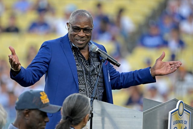 Aug 9, 2024; Los Angeles, California, USA;  Former Los Angeles Dodgers outfielder Dusty Baker speaks to fans after being inducted into the Dodgers Hall of Legends prior to the game between the Los Angeles Dodgers and the Pittsburgh Pirates at Dodger Stadium. Mandatory Credit: Jayne Kamin-Oncea-USA TODAY Sports/File Photo