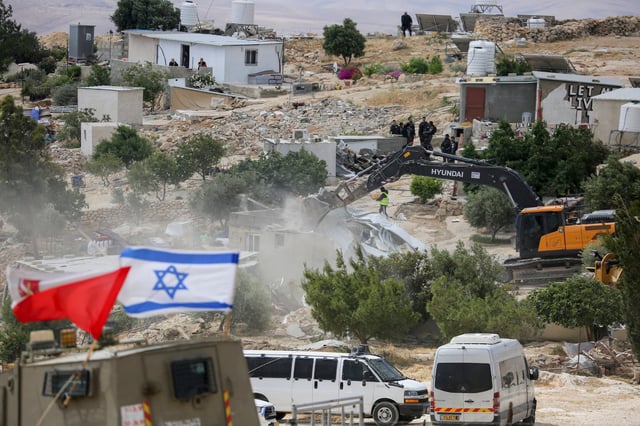 Israeli army, accompanied by bulldozers destroys Palestinian homes in the village of Khallet al-Dabaa in the Masafer Yatta area, south of Hebron in West Bank, displacing about 120 Palestinians on May 5, 2025. According to reports, Israel destroyed 150 Palestinian buildings and houses in West Bank in April only.