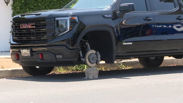 The tires of a GMC truck parked in Beverly Grove is stolen by thieves.